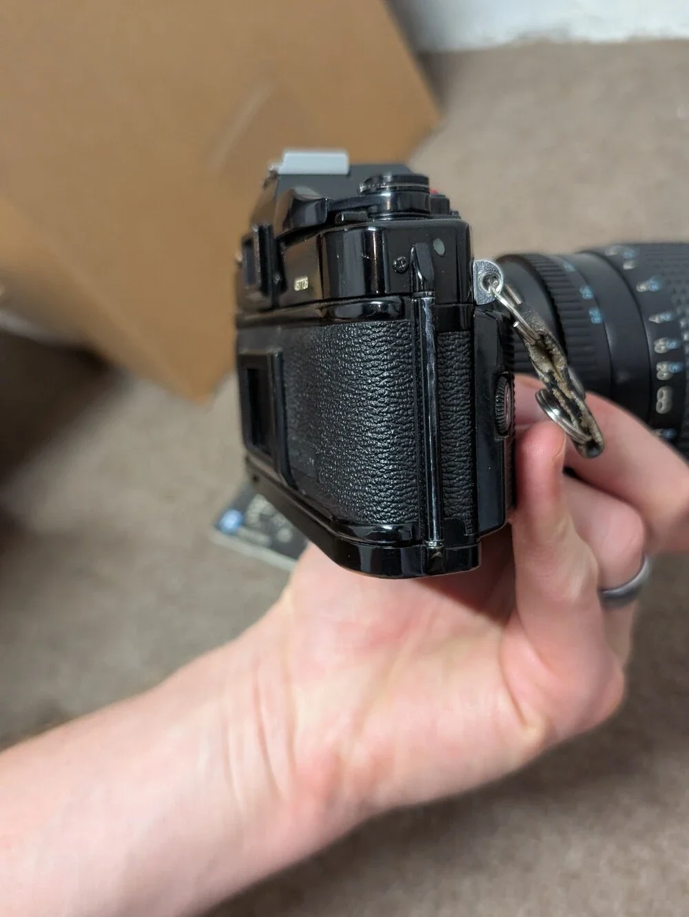Vintage Canon A-1 Black SLR Camera with Black Lens and Black Flash